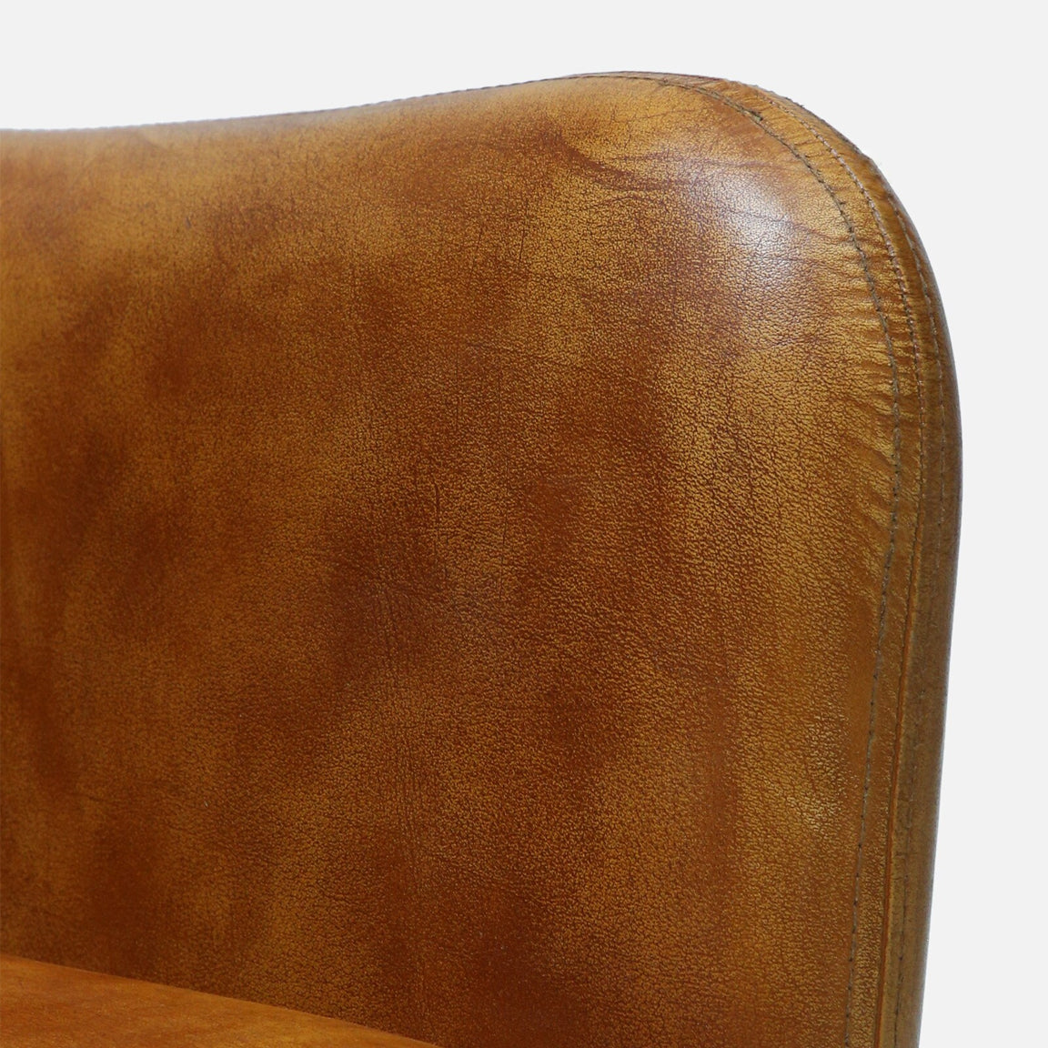 Genuine Leather Lounge Chair in Antique Tan Color with Metal Legs - close-up detail