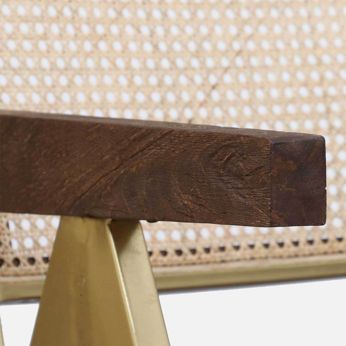 Solid Wood and Metallic Arm Chair with Rattan Back and Leather Seat - close-up detail